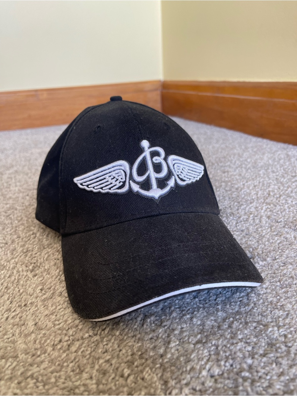 Breitling Black Cap with White Winged Anchor Logo